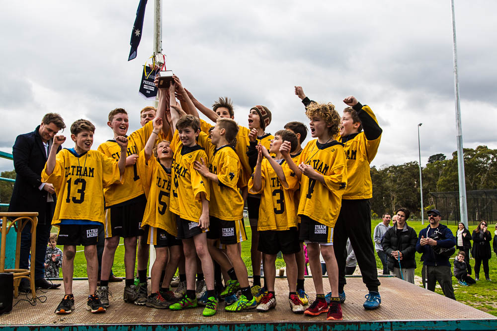 The team celebrates its perfect season